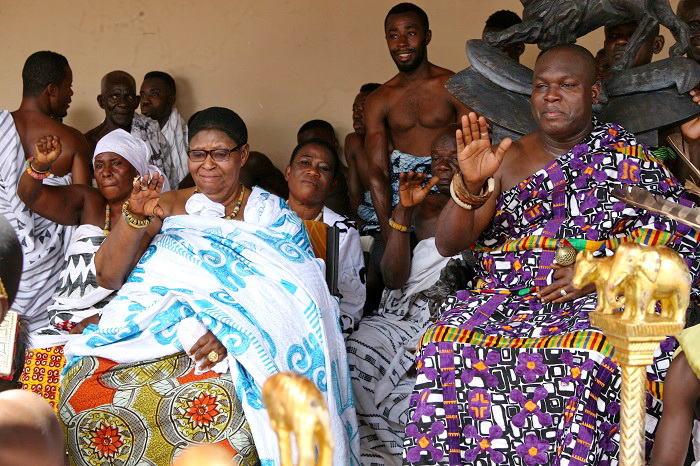 Odeneho Kwafo Akoto III (right), Omanhene of the Akwamu, and Nana Afrakoma II, Queen Mother of Akwamu, receiving cheers from the crowd at the durbar grounds